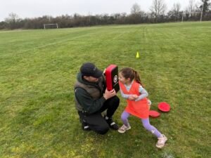 Violet showing us her strength against one of the dads! violet pass and move girls session